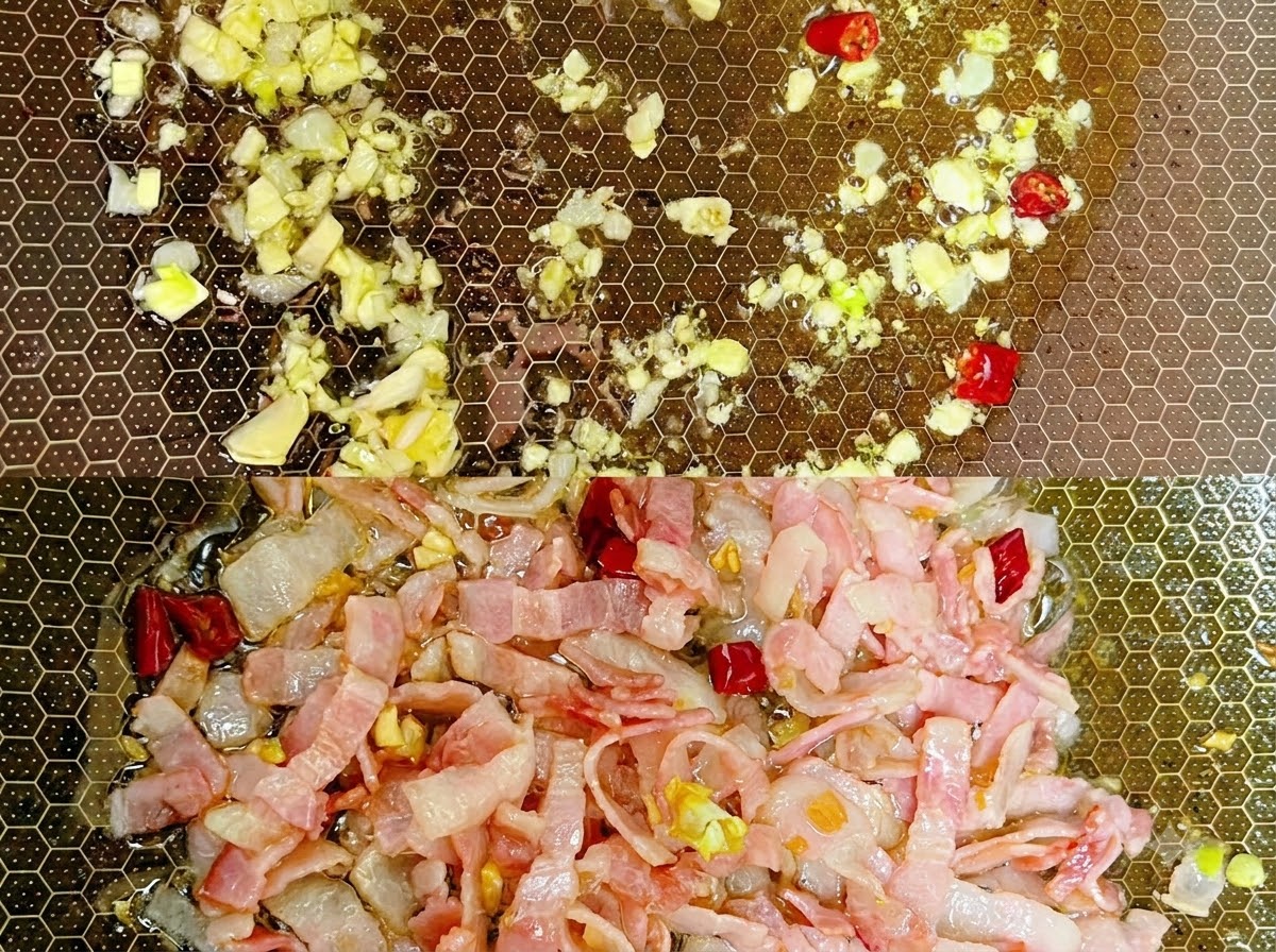 Ugotowane kluski spaghetti mieszane na patelni z przyprawami i płynem.